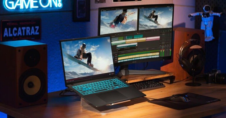 a laptop with a keyboard and a keyboard on a desk