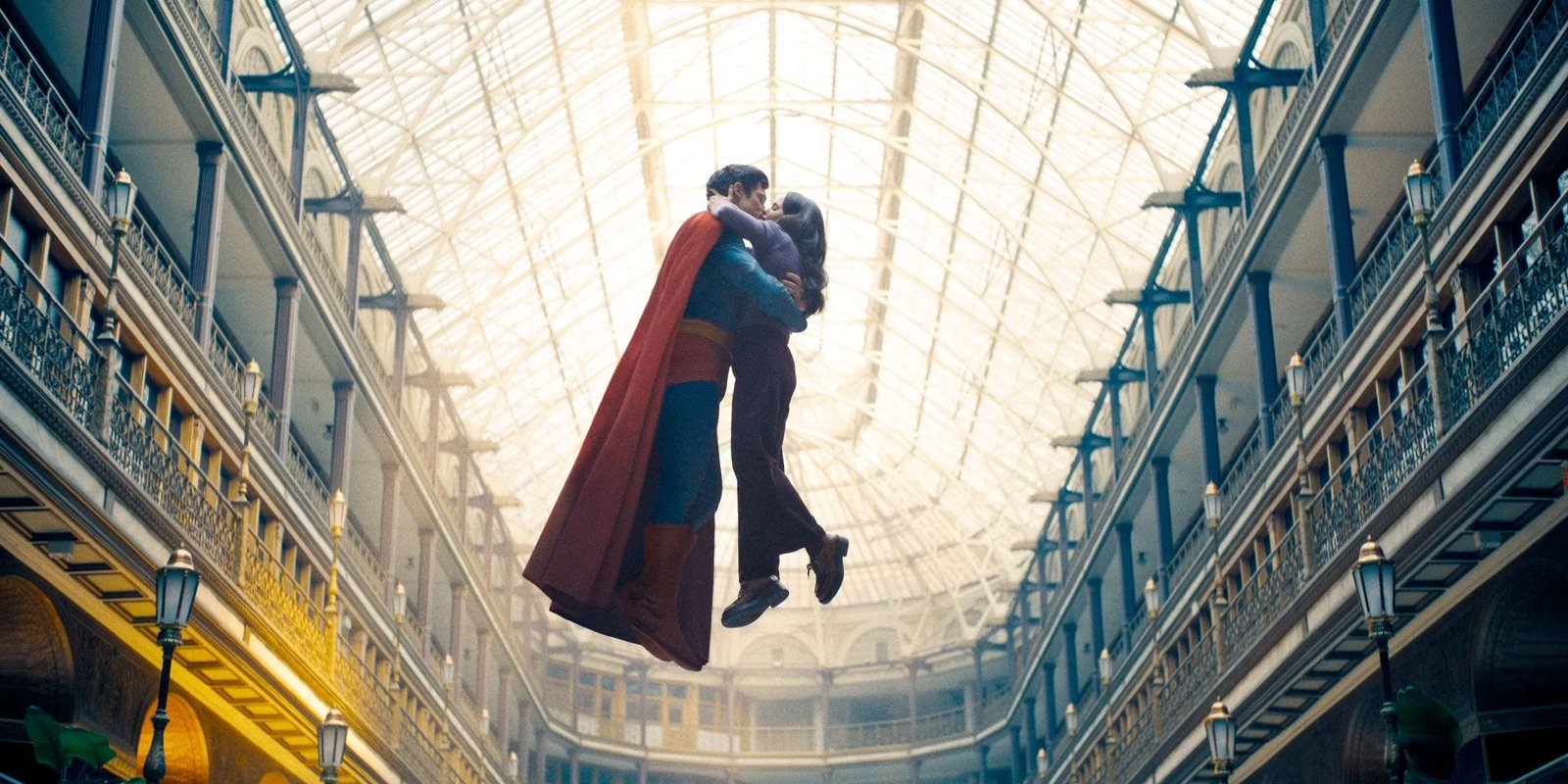 Superman flies while kissing Lois Lane