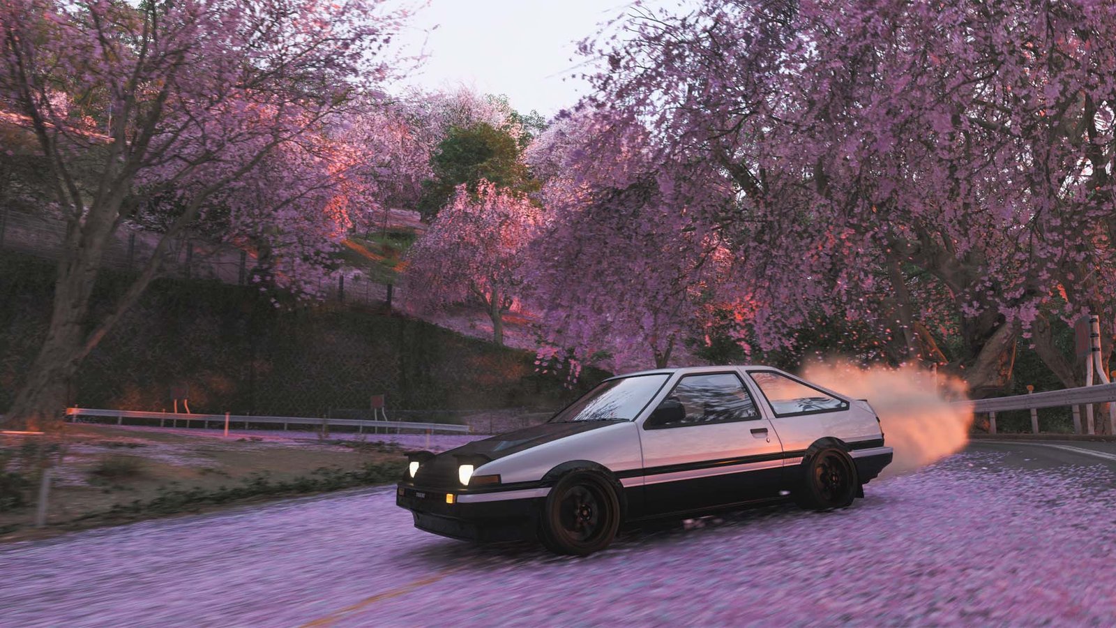 Cherry blossoms bloom as a Toyota AE86 Trueno drifts down Hakone Nanagamari in Forza Horizon 6