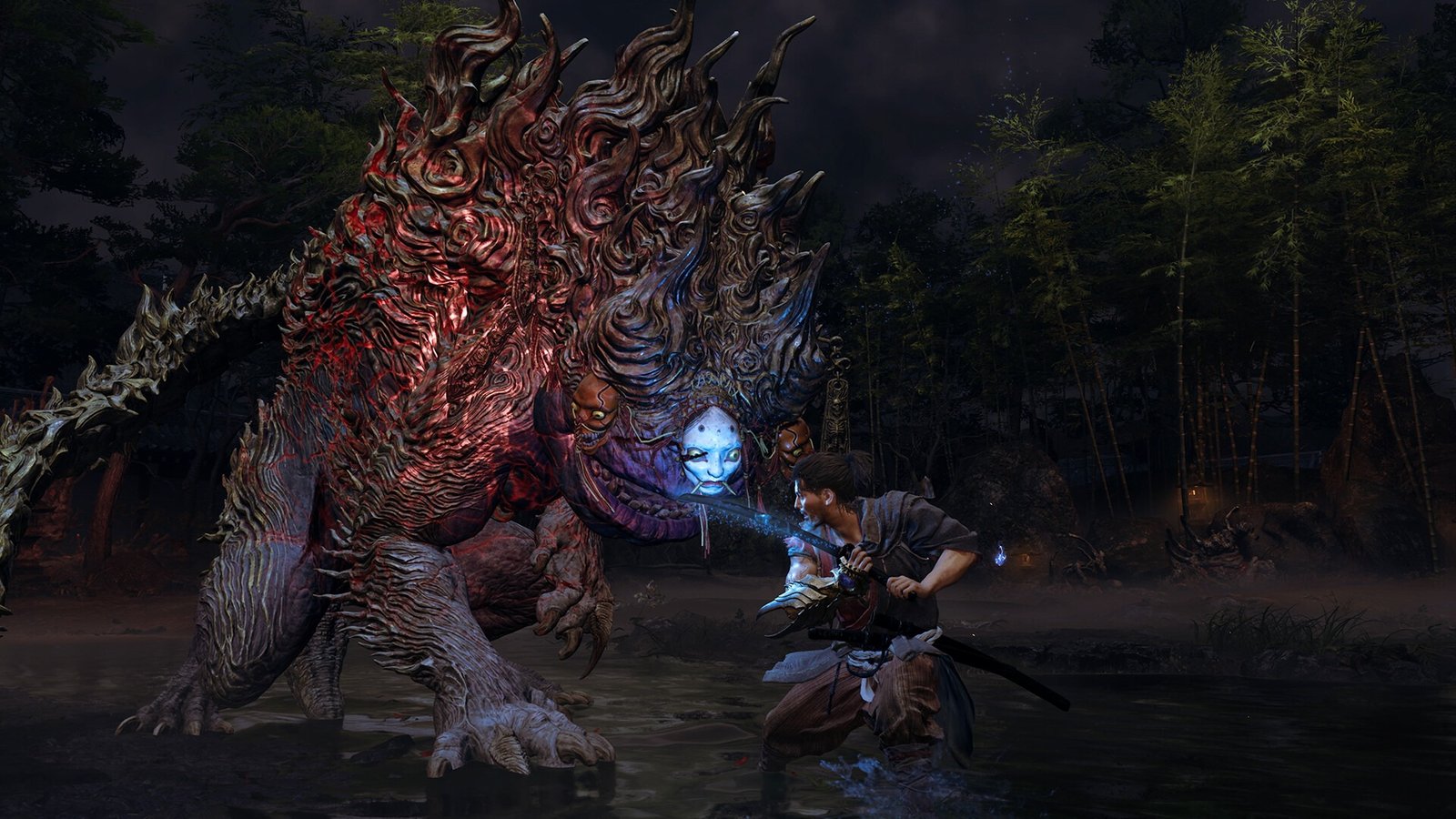Musashi Miyamoto fighting a big demon in Onimusha: Way of the Sword